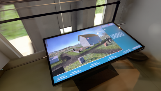 Touchtisch mit Häusernund Personen sowie Zeitleiste